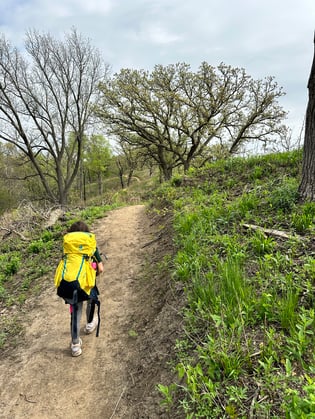 6 year old girl heads up a hiking trail