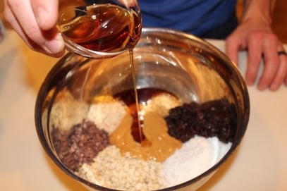 Mixing the ingredients of the hippy balls recipe. 